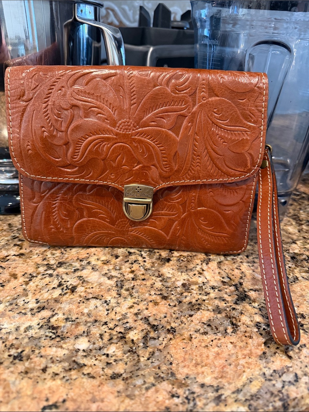 Patricia Nash tooled leather wristlet - floral embossed - built in wallet